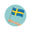 Sweden waving flag circle icon. Hand holding Swedish flag. National symbol. Vector illustration Royalty Free Stock Photo
